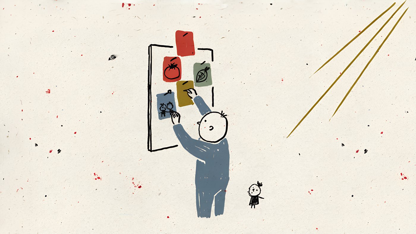 A person pinning coloured notes to a board.